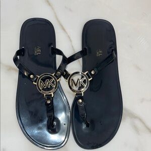 Michael Kors Black Sandals with Gold Emblem